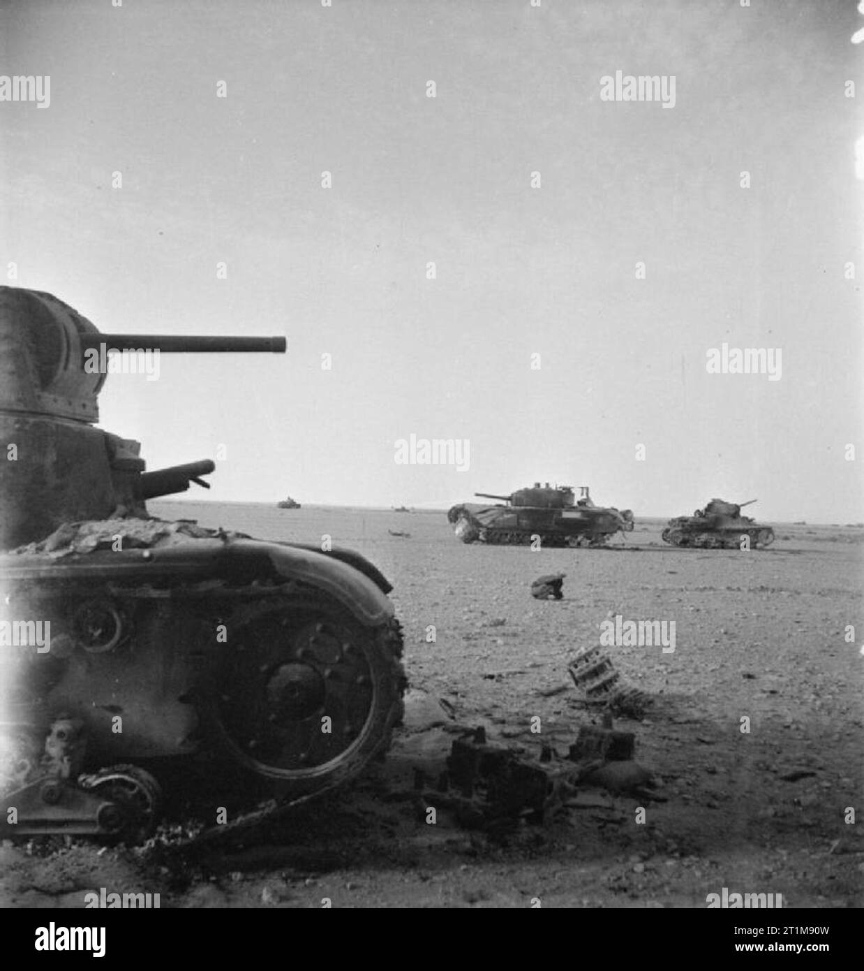 The British Army in North Africa 1942 A knocked-out Churchill III among abandoned Italian M13/40 tanks at El Alamein, 2 November 1942. The Churchill was one of six rushed to the front line and placed under control of 7th Motor Brigade, 1st Armoured Division, in time for Montgomery's offensive at El Alamein. The group was named Kingforce after its commander, Major Norris King MC. Stock Photo