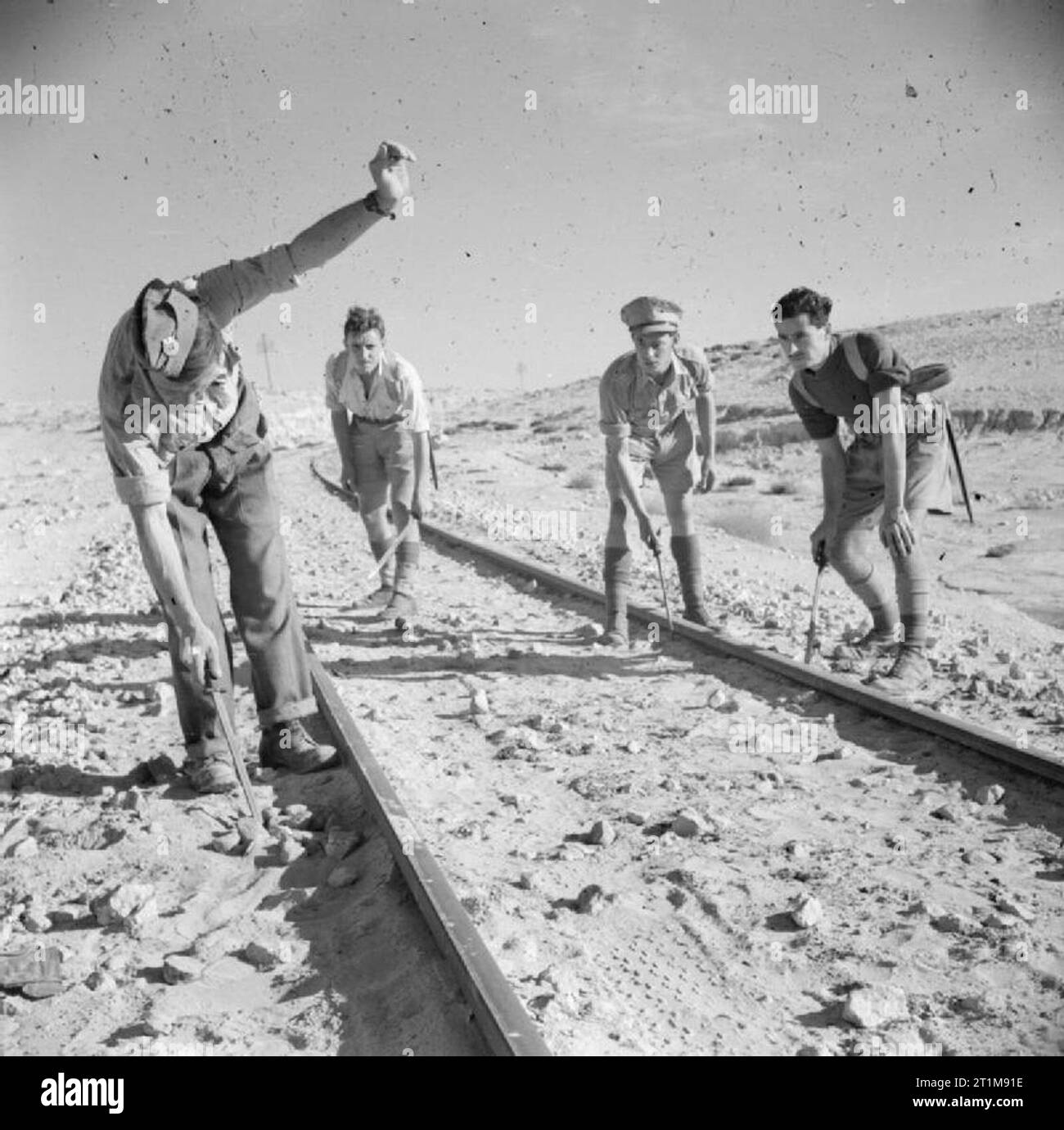 The British Army in North Africa 1942 A sapper discovers a mine beside ...