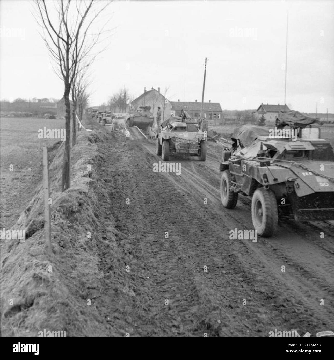 The British Army in North-west Europe 1944-45 Humber scout cars lead a ...