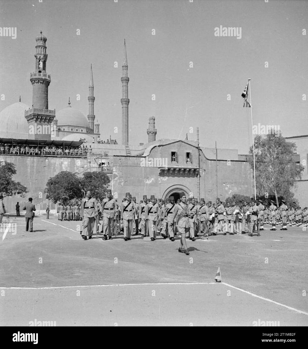 British Forces in the Middle East, 1945-1947 Under the shadow of the Blue Mosque, a contingent of the Egyptian Army marches into the courtyard of the citadel in Cairo during the ceremony marking the handing over of the fortress to local control. This was a first step towards the ending of British rule in Egypt. Stock Photo