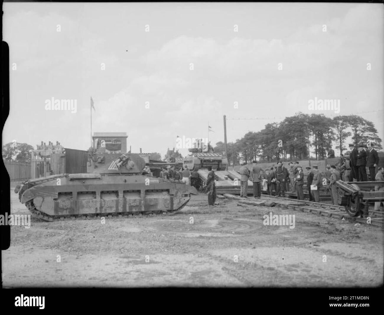 The British Army in the United Kingdom 1939-45 Matilda II tanks of the Royal Tank Regiment, 1st Armoured Division, being loaded onto a flatbed railway wagons, 22 July 1940. Stock Photo