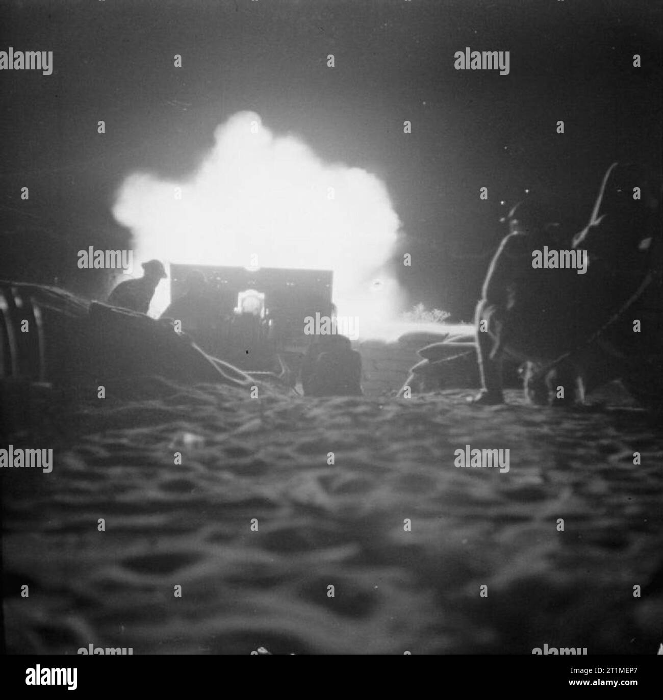 The Campaign in North Africa 1940-1943 A 25-pdr gun firing during the