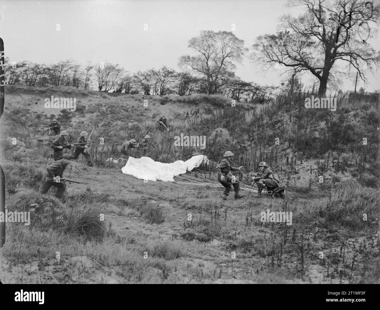The Home Guard 1939-1945 The Home Guard: Men of the 5th Battalion (Doncaster) Home Guard rounding up an 'enemy' parachutist during training for assisting the Army in the event of an invasion. Stock Photo