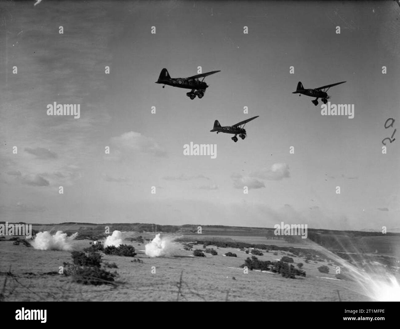 The Polish Air Force in Britain, 1940-1947 Three Westland Lysander Mark IIIAs of the 309 Polish Squadron (part of the RAF Army Cooperation Command), based at Dunino, Fife, taking part in a low-level bombing exercise on a range in Scotland. Stock Photo