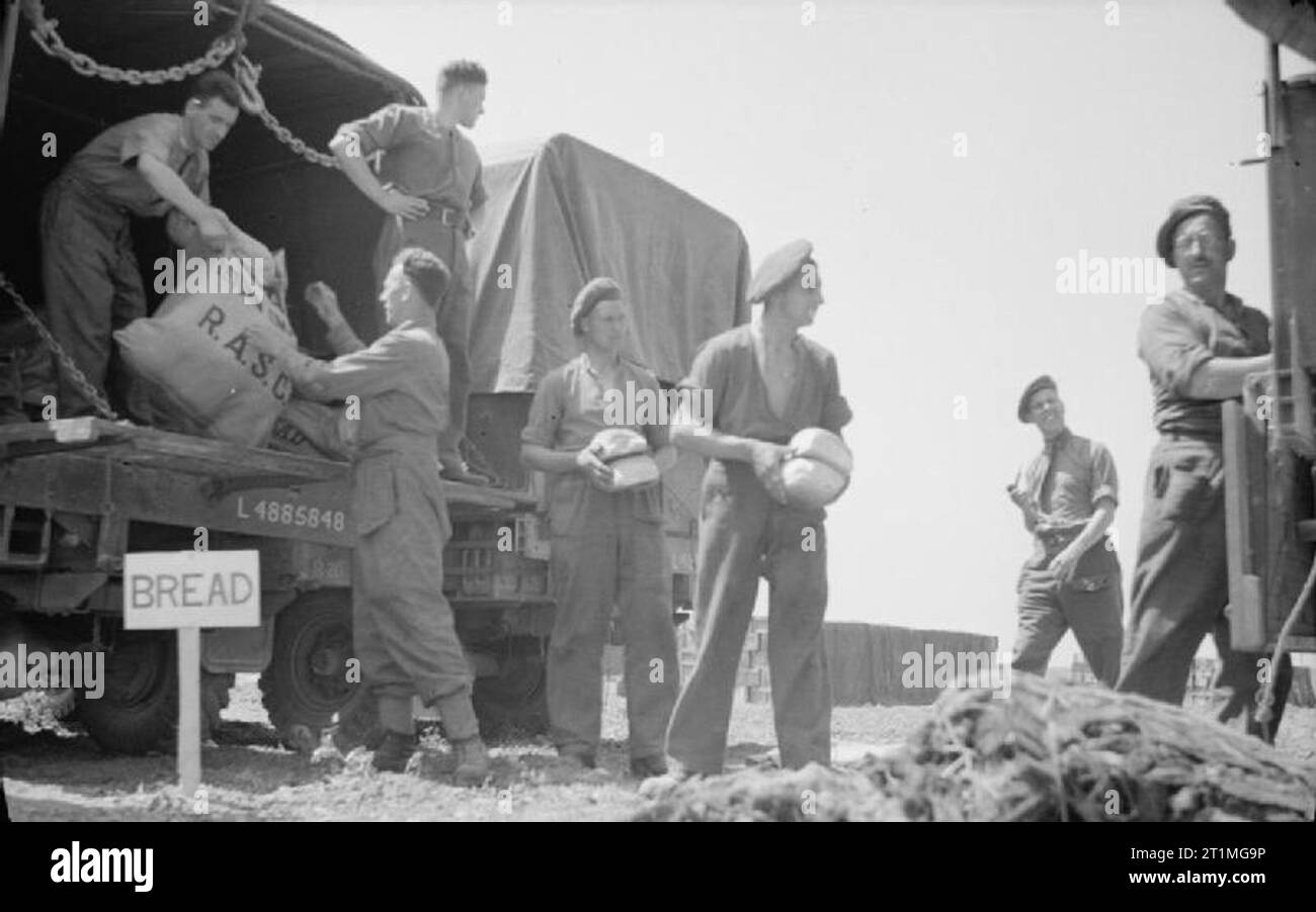 War Office Second World War Official Collection Troops unloading bread ...