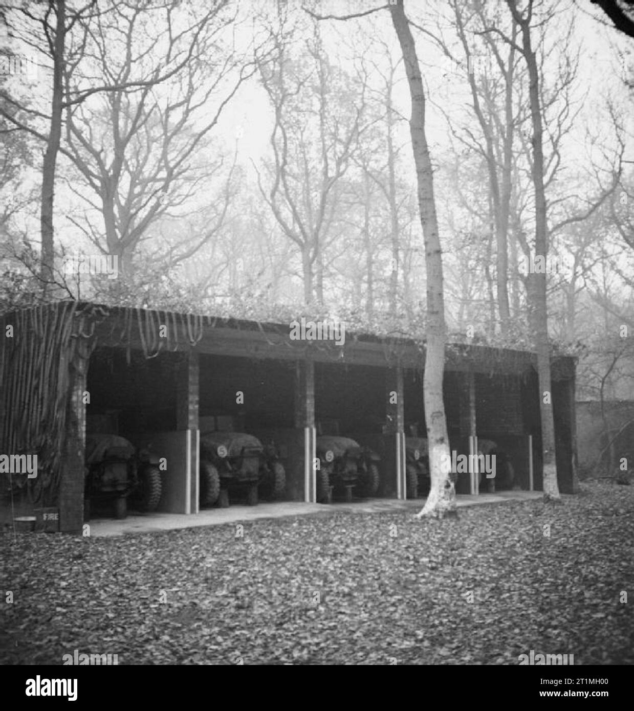 Chemical Warfare in the Twentieth Century- the Second World War A series of photographs taken specially for WS9 on the method of storing and stacking ammunition in the field. Photographs taken at Shefford (27 Ammunition Sub Depot), Bedfordshire. BCVs (Bulk Contamination Vehicles) in their brick garages. Stock Photo