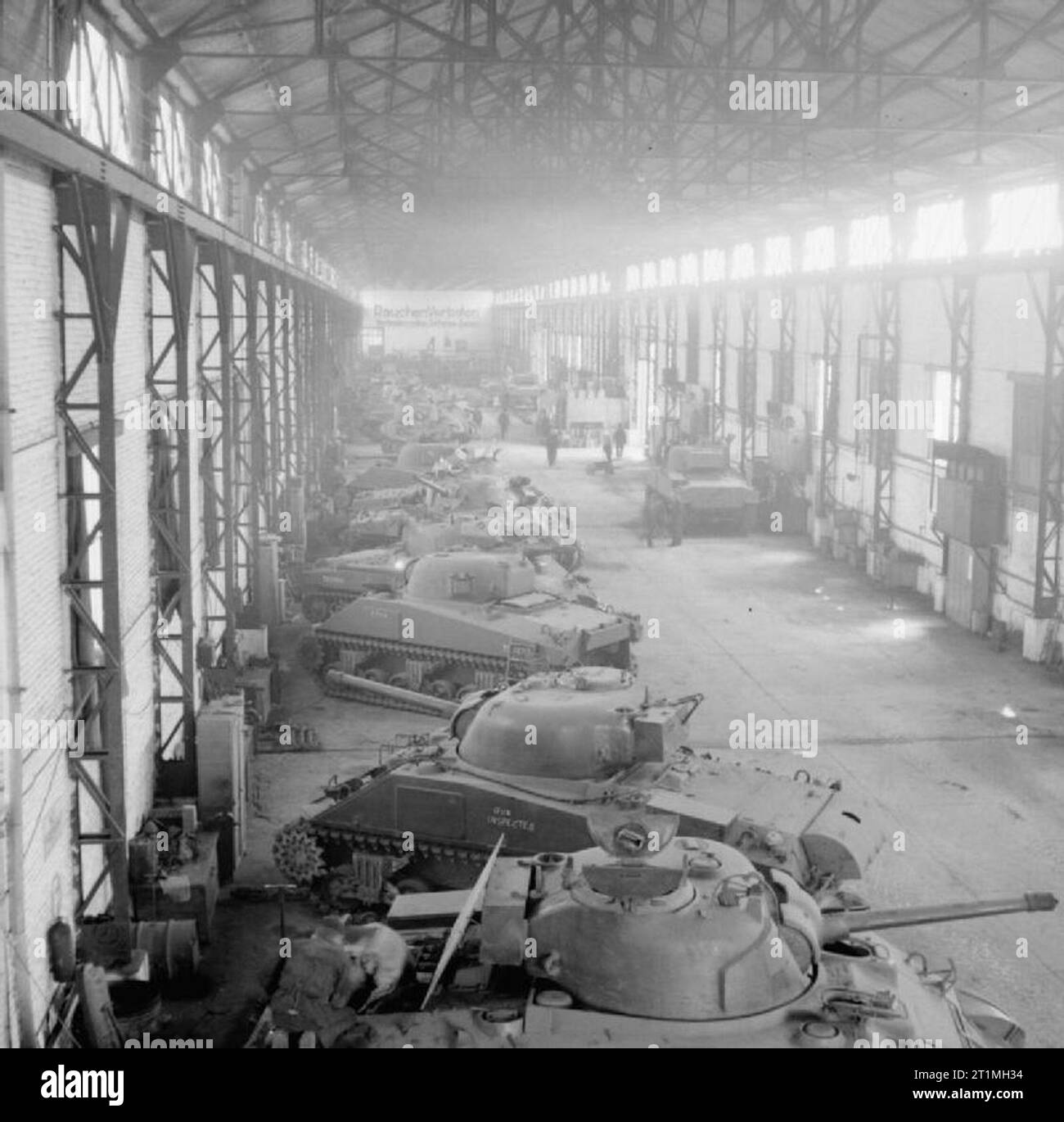 Commonwealth Forces in North-west Europe 1944-45 Sherman tanks inside a building at 1st Canadian Advanced Base Workshops, Belgium, 19 - 20 May 1945. Stock Photo