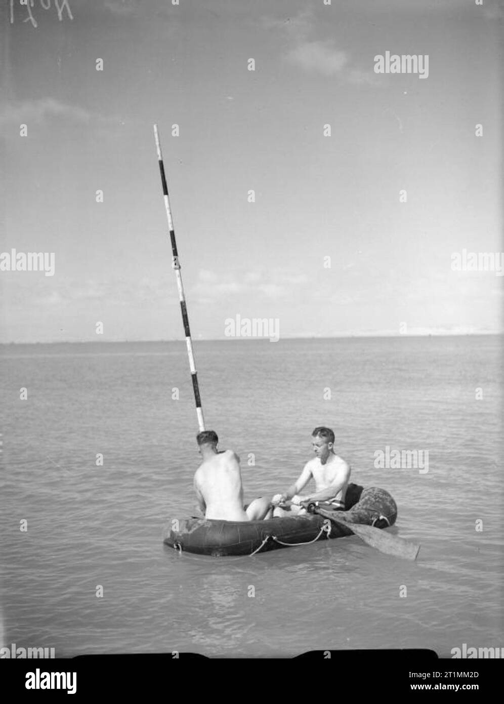The Royal Navy during the Second World War Two men taking soundings