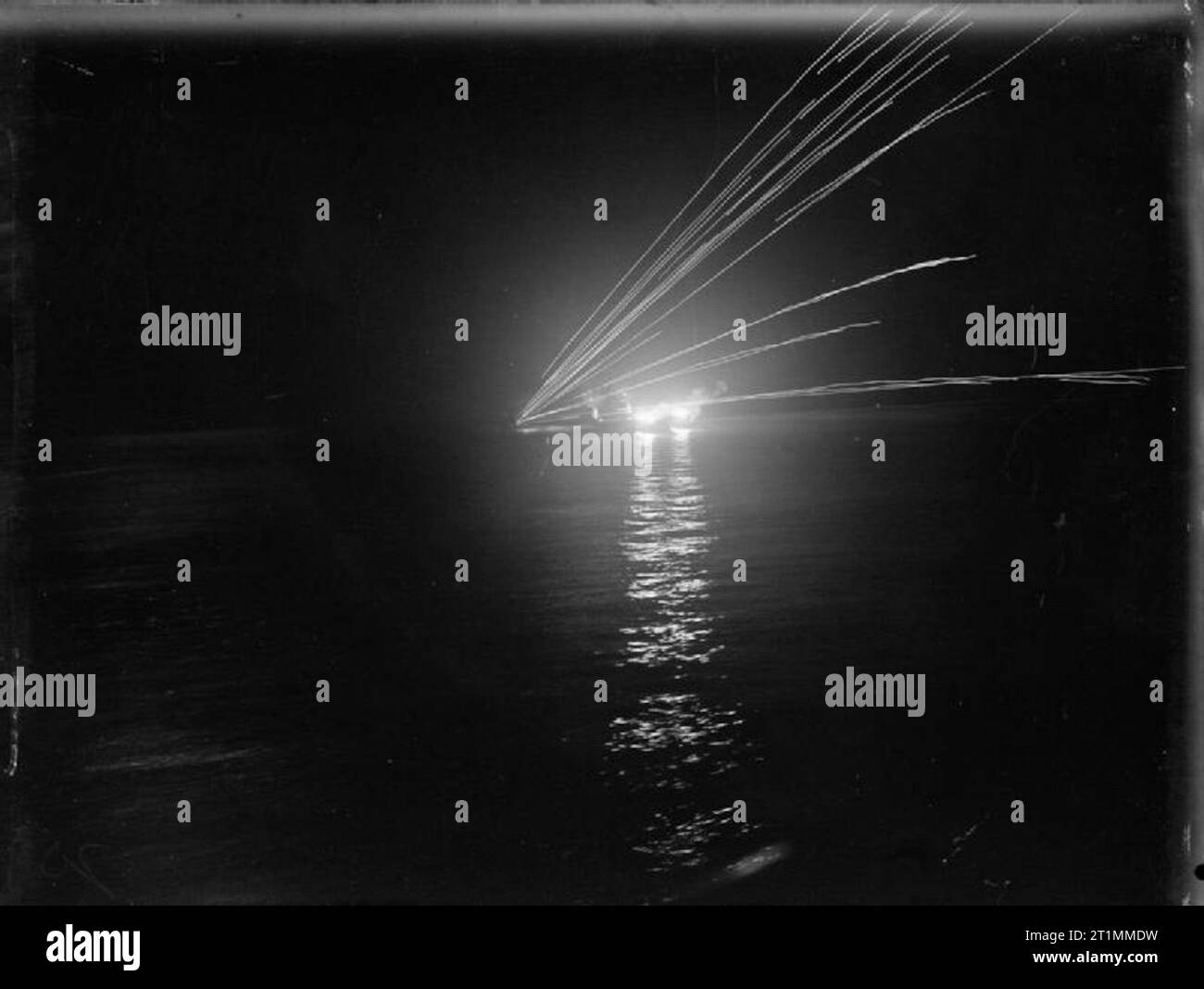 The Royal Navy during the Second World War Salerno, 9 September 1943 (Operation Avalanche): During Operation AVALANCHE, a night photograph taken from the battleship WARSPITE during the landings, showing the effect of anti-aircraft fire from Allied warships in response to low level German aerial torpedo attack. It lasted for two hours and the destroyer INGLEFIELD shot down one of the raiders. WARSPITE successfully dodged two torpedos. Stock Photo