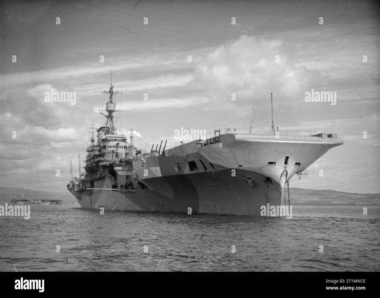 The Royal Navy during the Second World War HMS IMPLACABLE at anchor off ...