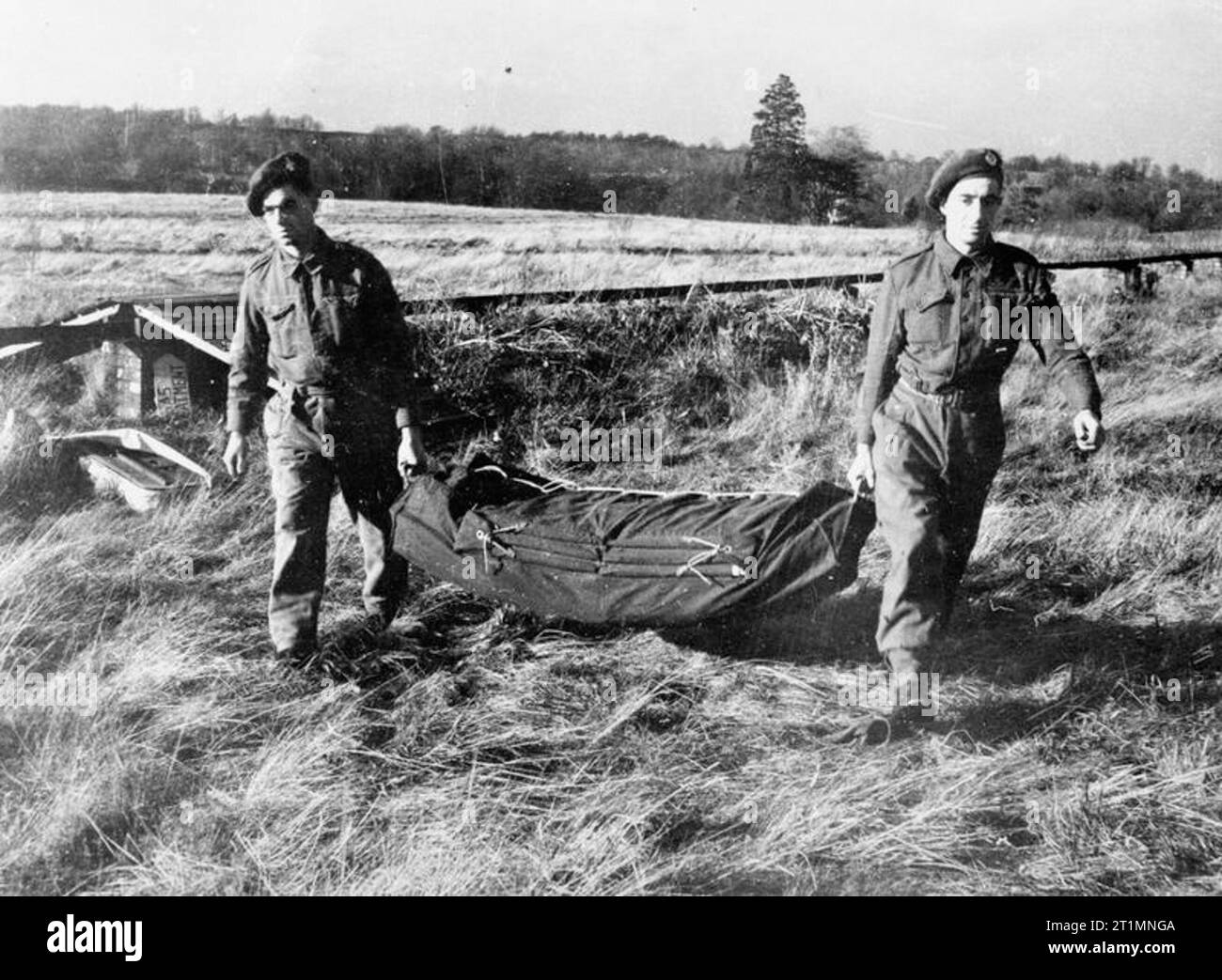 Pneumatic Decoys Soldiers carrying a deflated Sherman decoy tank, this