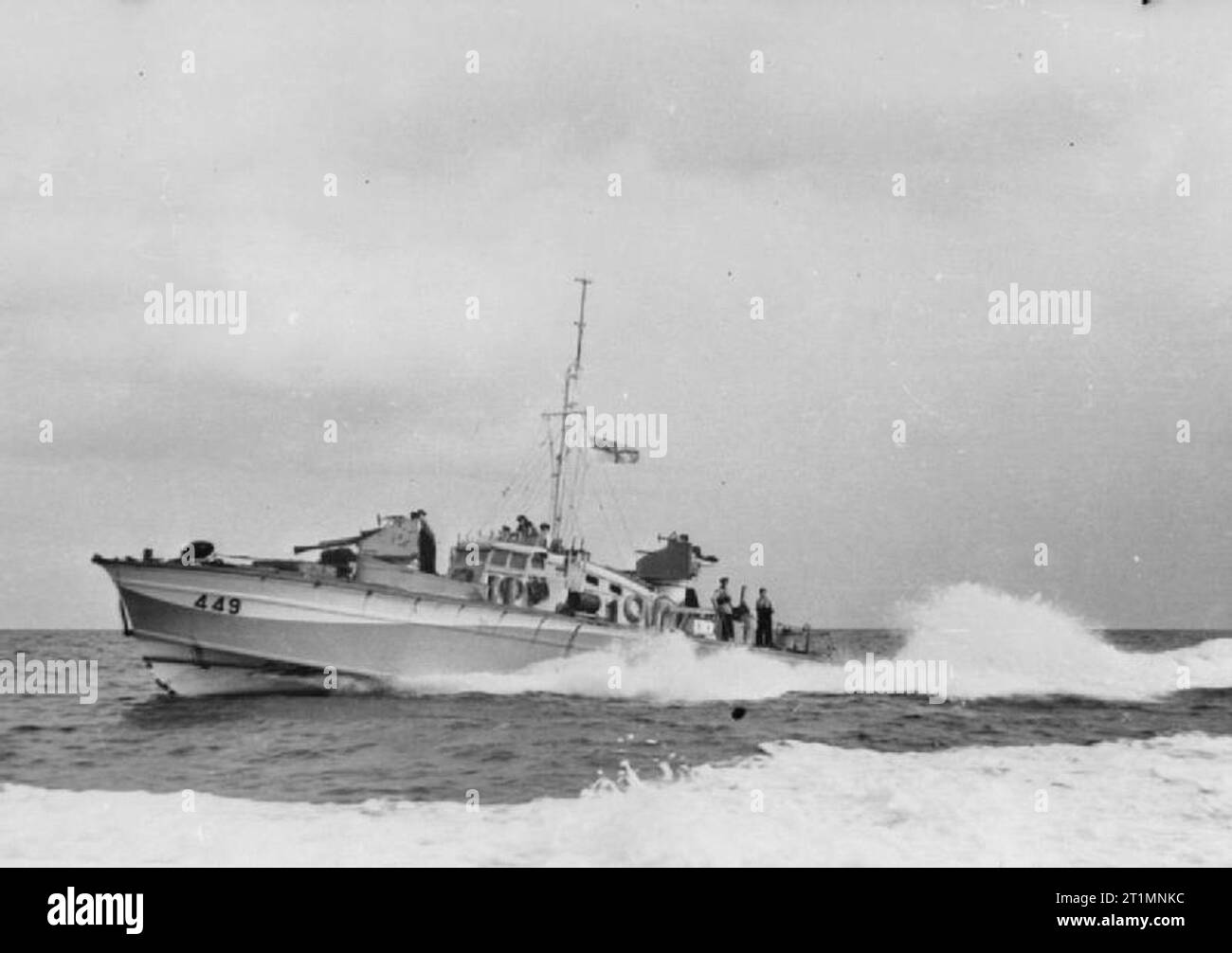 The Royal Navy during the Second World War 71.5ft British Power Boat MTB 449 based at the coastal forces base HMS BEEHIVE. The boat was not fitted with tubes and was really a Motor Gun Boat. Powered by three Packard engines, it had a complement of two officers and 14 ratings. The armament included a 2pdr pom-pom and three 20mm Oerlikons. Stock Photo