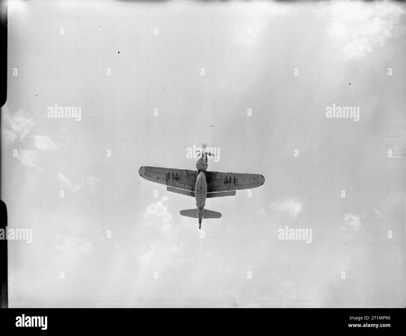 The Royal Navy during the Second World War A Fairey Barracuda Mk III carrying the lifeboat before the demonstration drop of the navy's airborne lifeboat off Lee-on-Solent. The lifeboat, which is 17 ft, 9 ins long, was dropped by parachute to an air crew who were supposed to have forced landed into the sea. The lifeboat, self-righting, and self-baling is equipped with sails and an outboard engine which gives it a range of 120 miles at 4 knots. It contains special water purifying units, first aid outfits, rations and cigarettes. Stock Photo