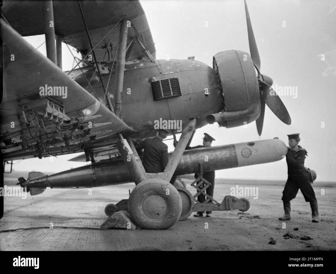 The Royal Navy during the Second World War Fitting the torpedoes on to