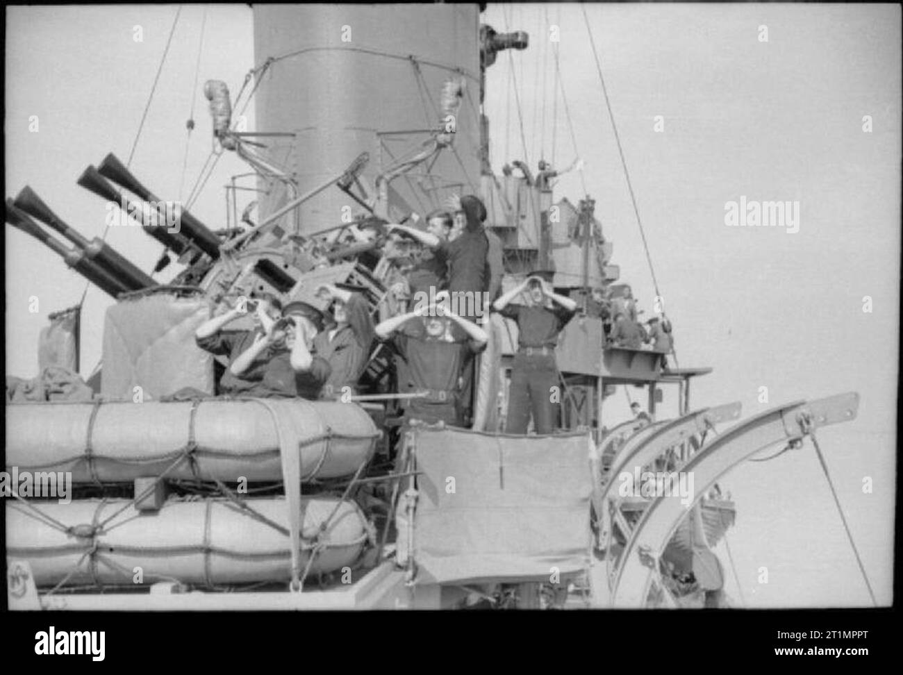 The Royal Navy During The Second World War Shading Their Eyes A Gun 