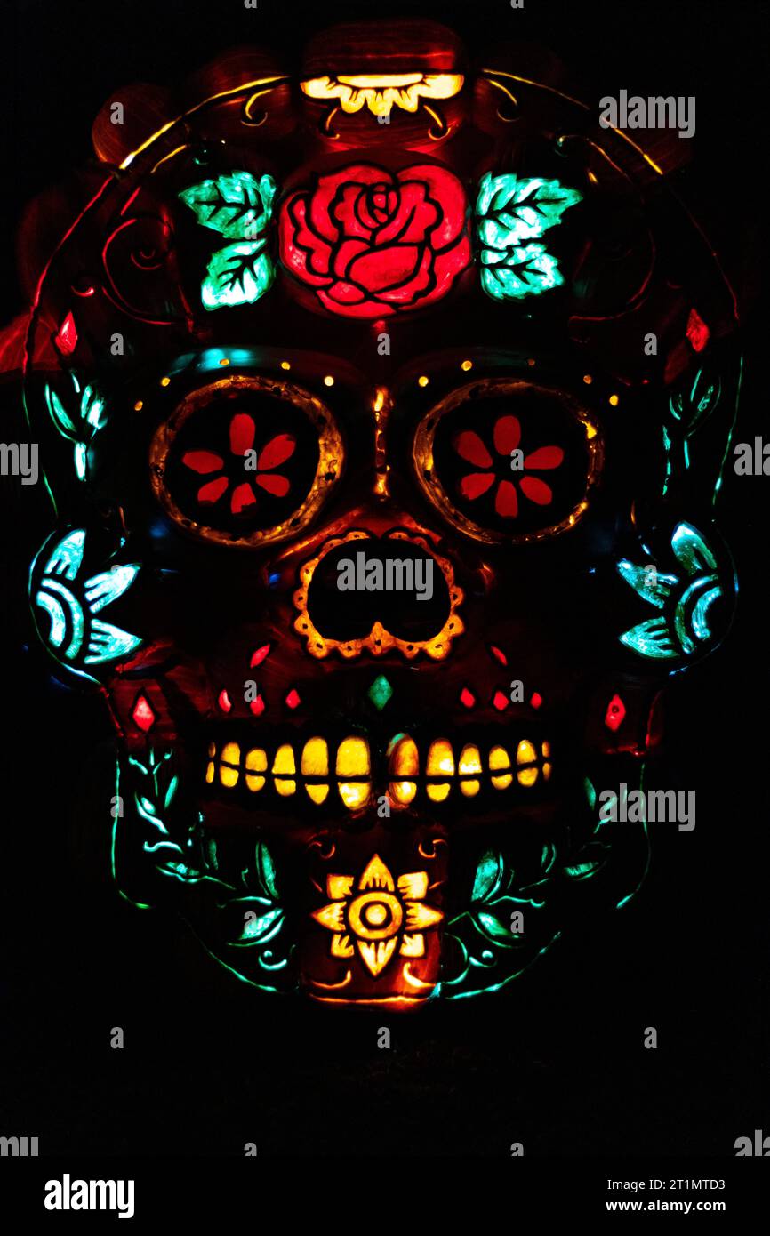 sugar skull illuminated on black background Stock Photo