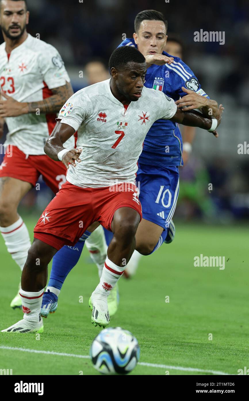 Malta's forward Joseph Essien Mbong challenges for the ball with