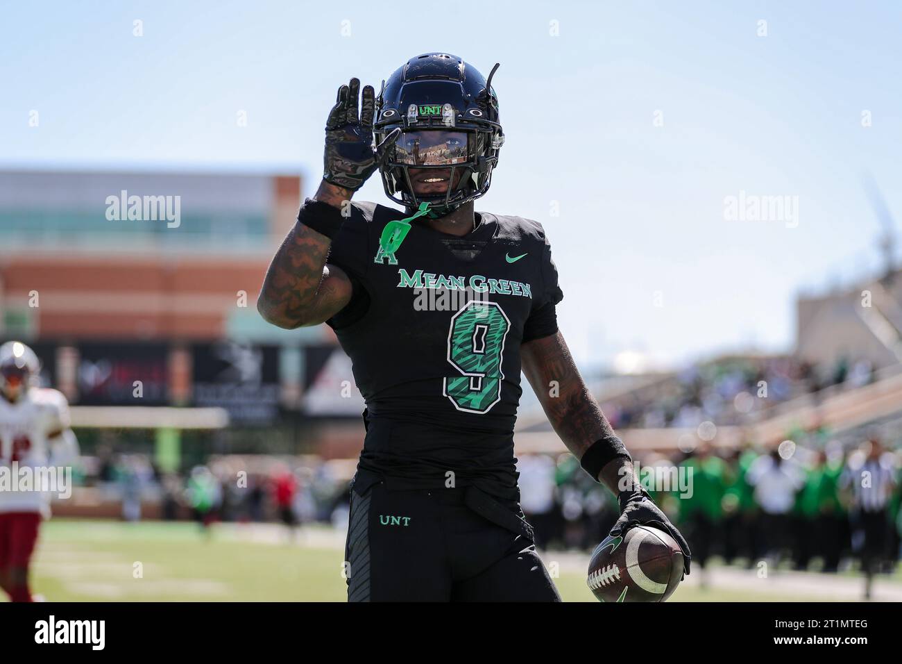 October 14, 2023:.North Texas Mean Green wide receiver Ja'Mori Maclin (9) waves to fans after scoring a touchdown during the fourth quarter of the NCAA Football game between the Temple Owls and
