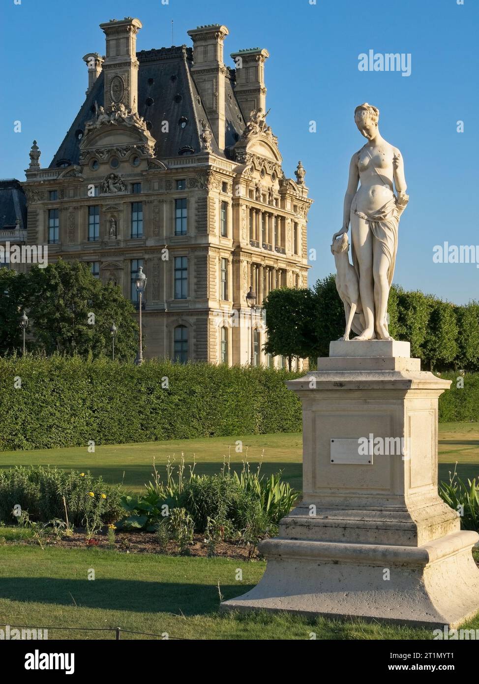 Paris, France — July 2008: Louis Auguste Leveque sculpture Diane Huntress in Tuileries Garden before Pavillon de Flore of the Palais du Louvre Stock Photo