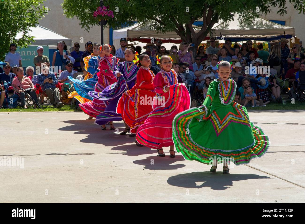 Mesilla, NM USA — May 6, 2023: Girls perform traditional dance for Cinco de Mayo weekend celebration of community in town square Stock Photo