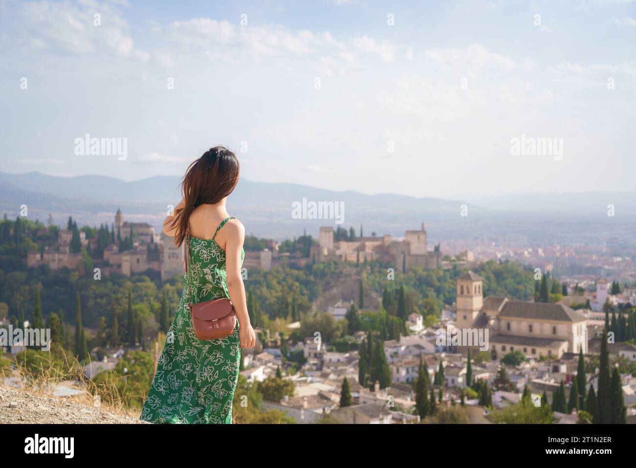 Woman standing on mountain hi-res stock photography and images - Alamy