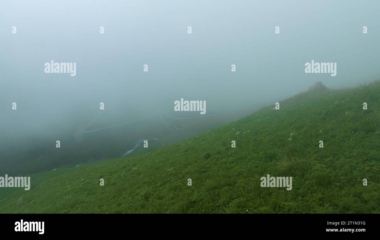 mountain peak and the river flowing through it. Green mountains black ...