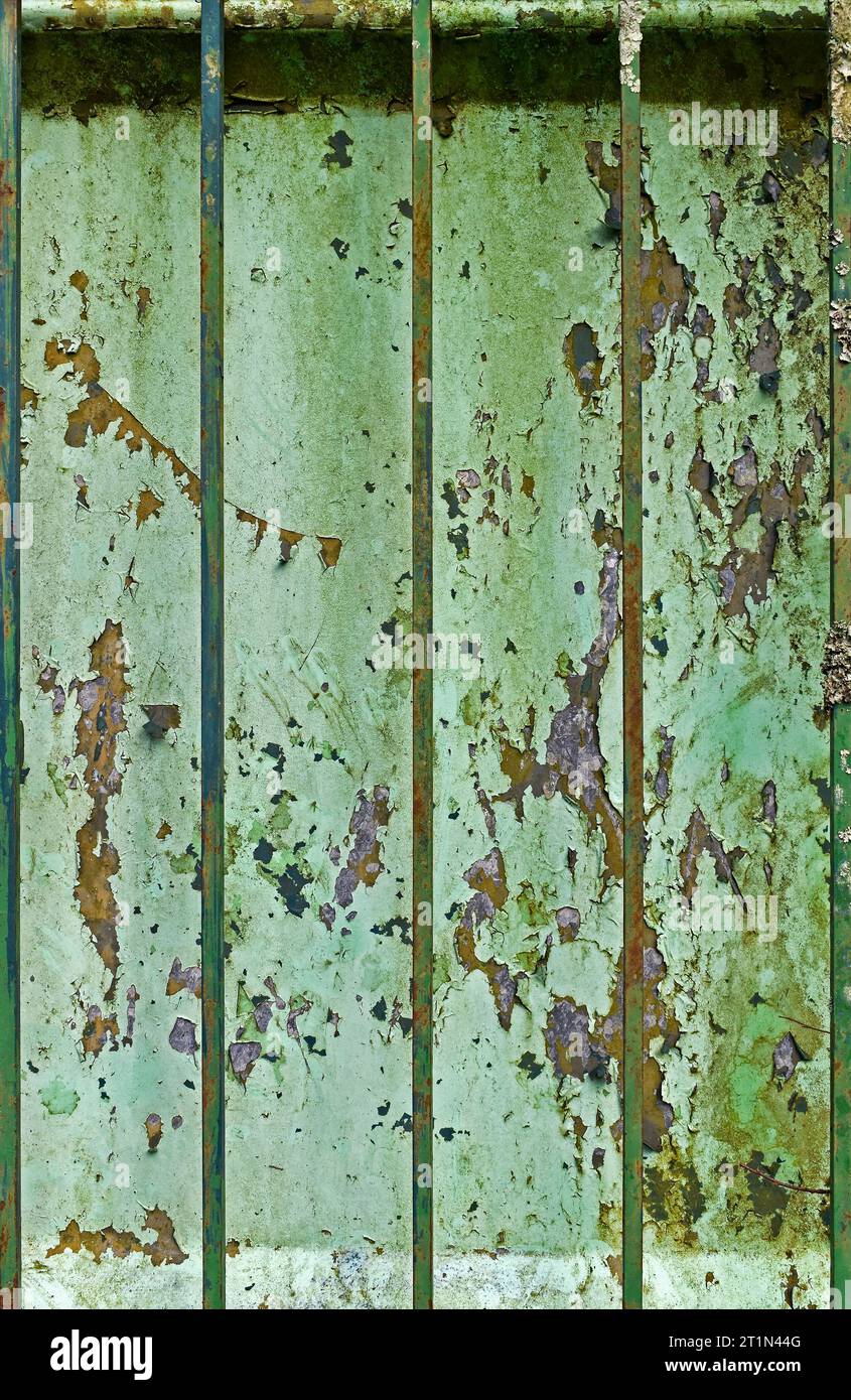 Old metal gate with peeling paint Stock Photo