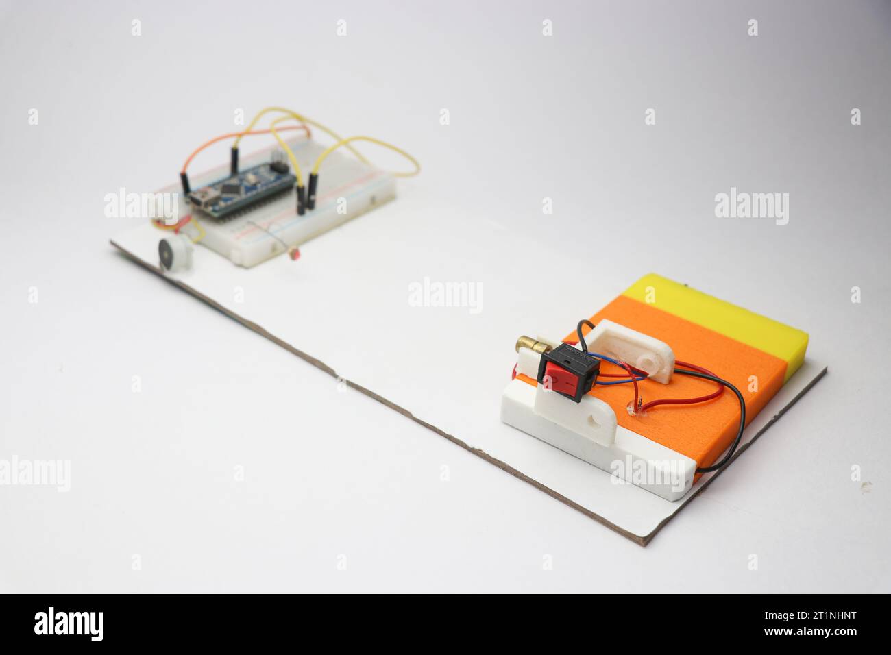 Prototype of a laser security alarm device built on a piece of board