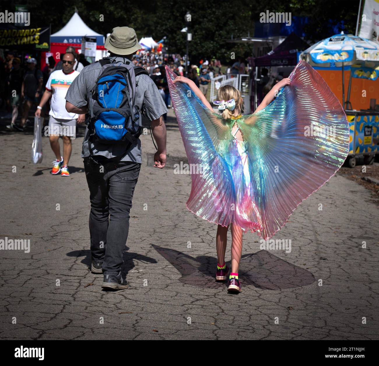 Atlanta, USA. 14th Oct, 2023. A father escorts his gender