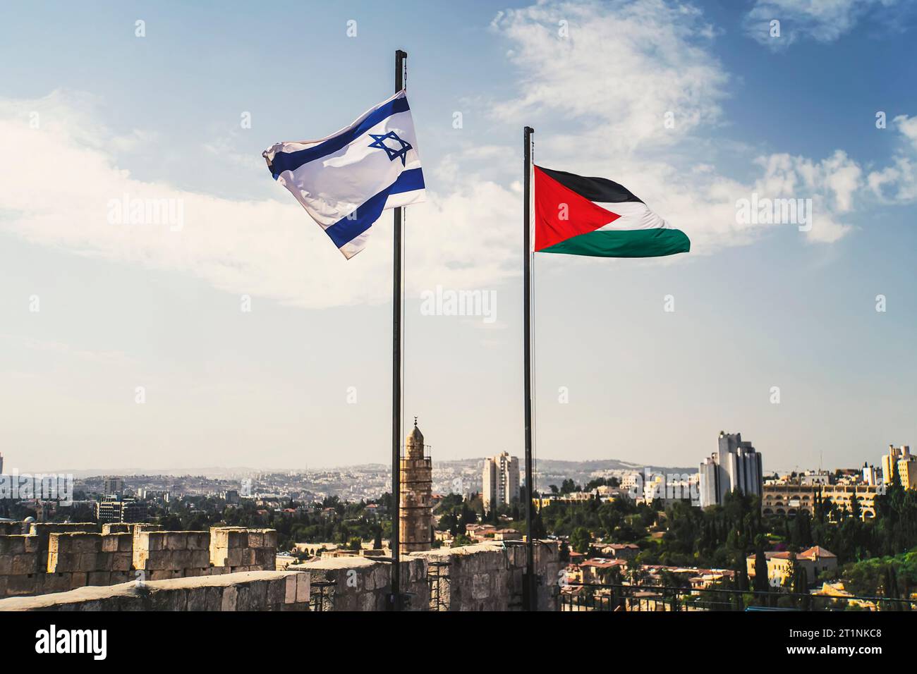 flags of Palestine and Israel against sky and old Jerusalem. Two States for two peoples. Two-state solution concept. Separate ownership of Jerusalem. Stock Photo
