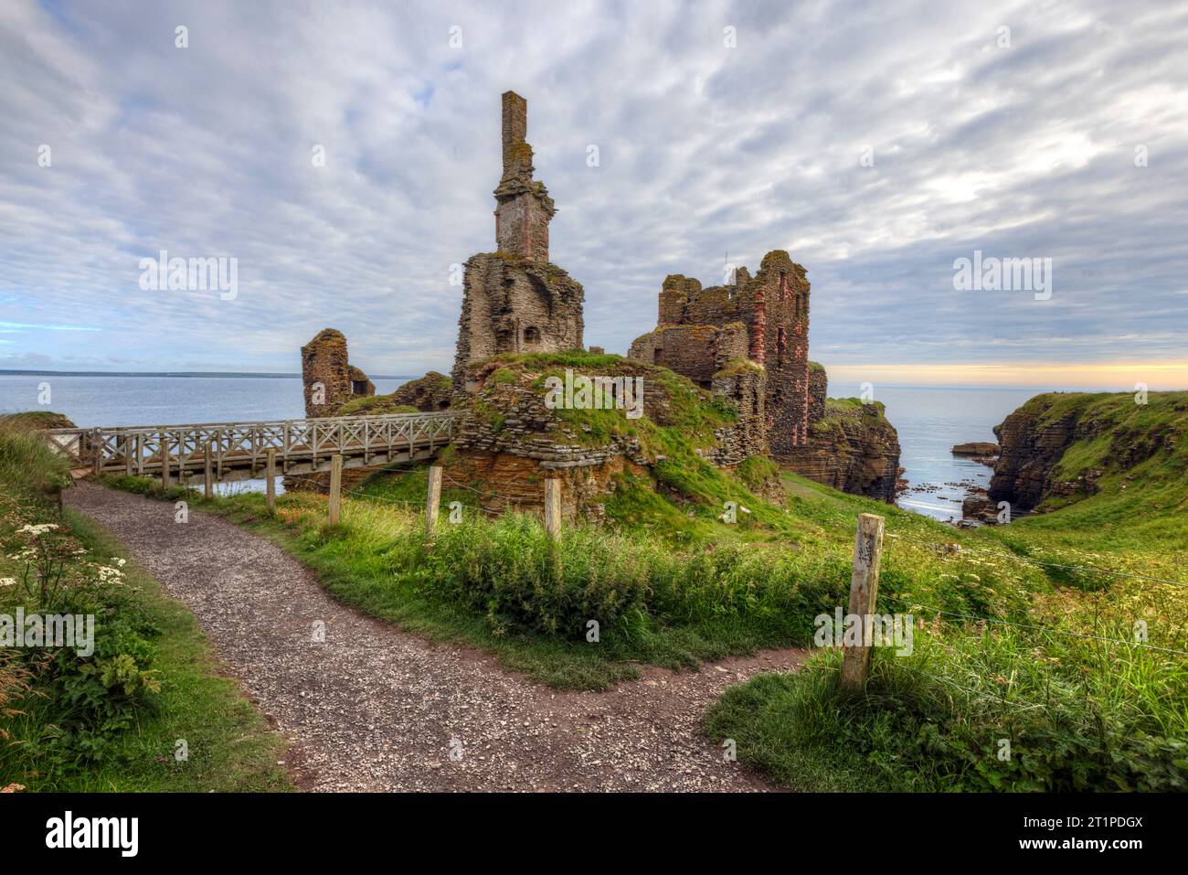 Castle Sinclair Girnigoe is a ruined castle located on a clifftop overlooking the town of Wick in Caithness, Scotland. Stock Photo
