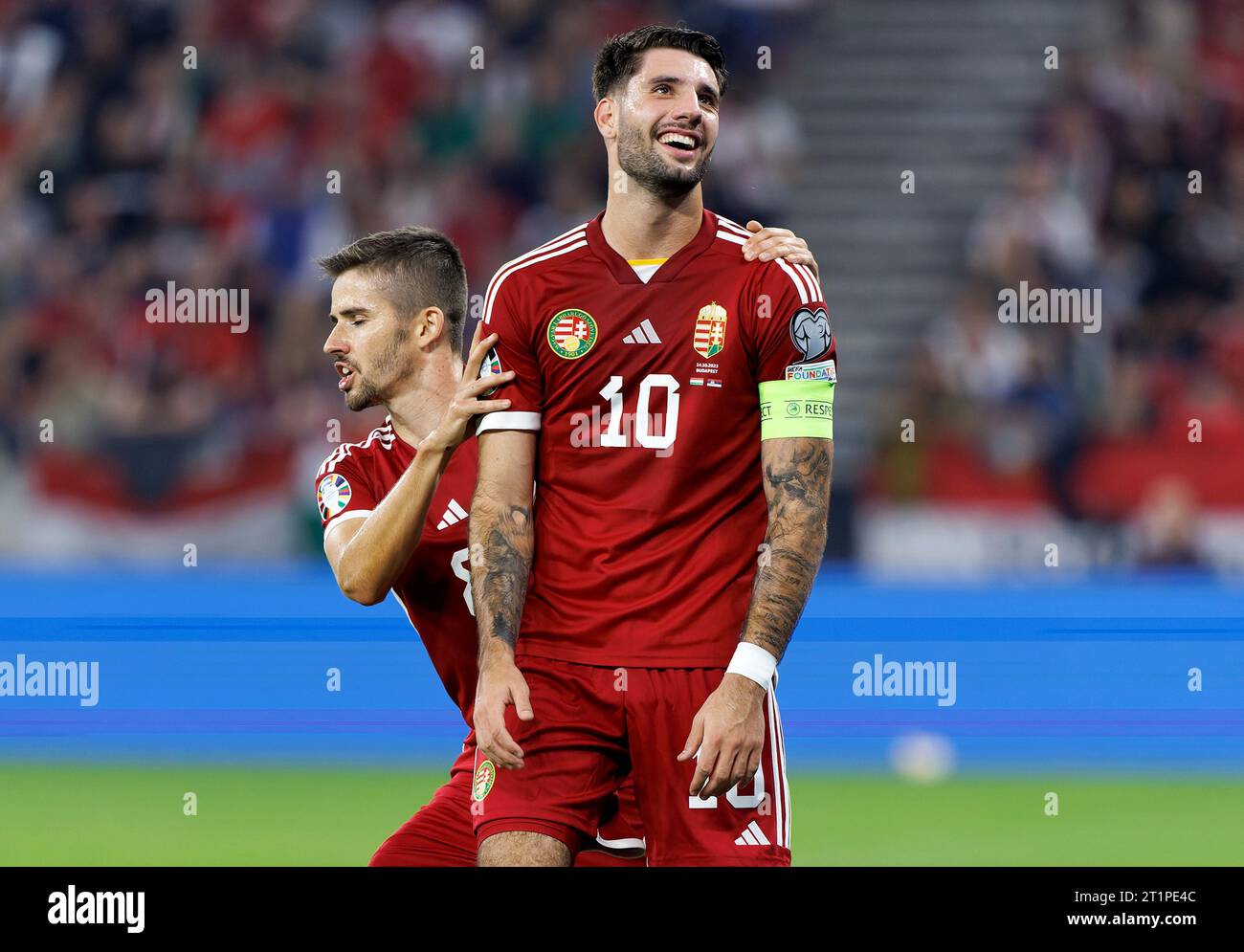 Budapest, Hungary. 14st October, 2023. Dominik Szoboszlai of Hungary reacts in his teammate’s company, Adam Nagy of Hungary during the UEFA EURO 2024 European qualifier match between Hungary and Serbia at Puskas Arena on October 14, 2023 in Budapest, Hungary. Credit: Laszlo Szirtesi/Alamy Live News Stock Photo