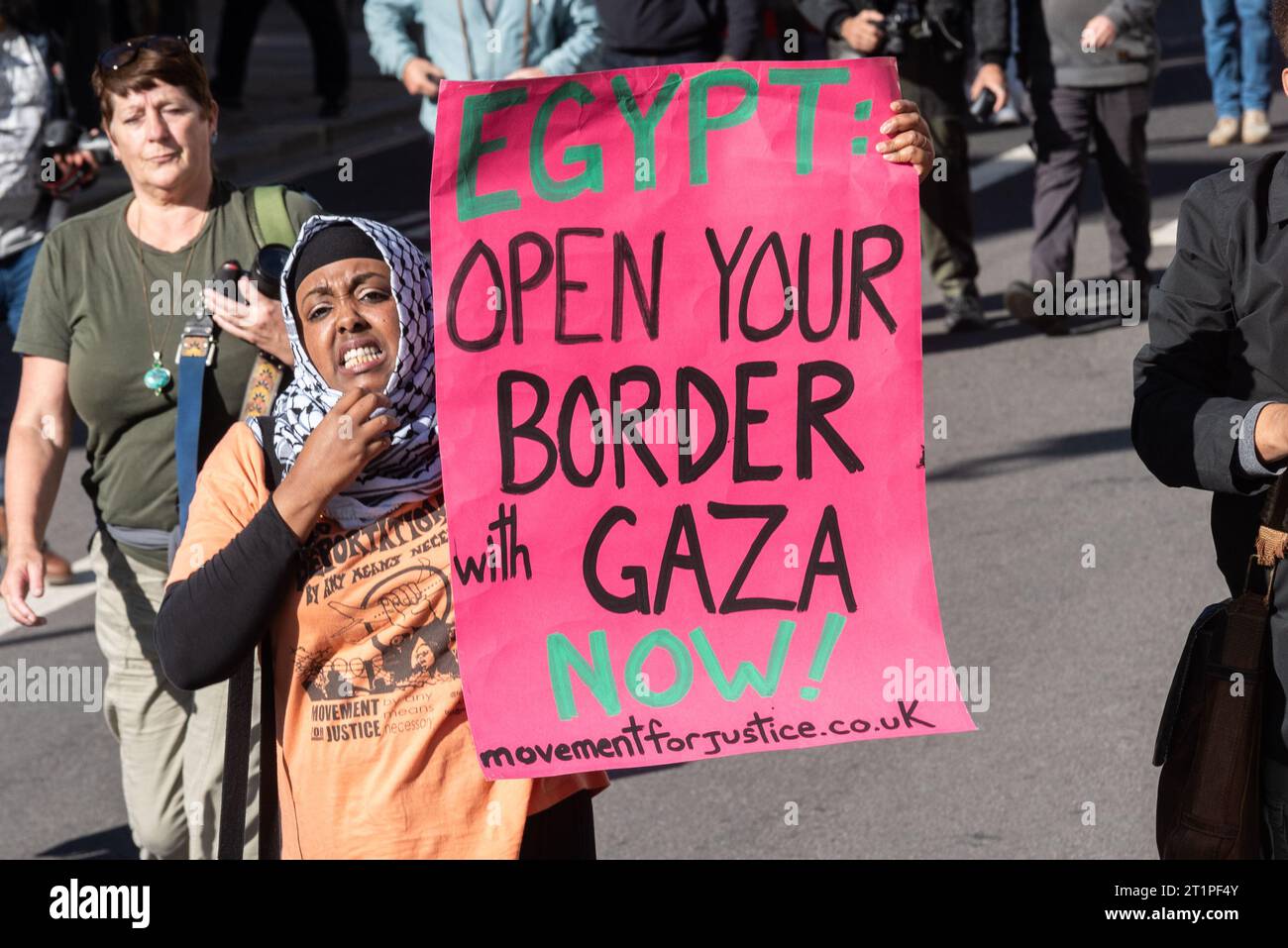 Protest for Palestine after escalation of military action in the Gaza Strip conflict between Israel and Hamas. Egypt, open your border with Gaza sign Stock Photo