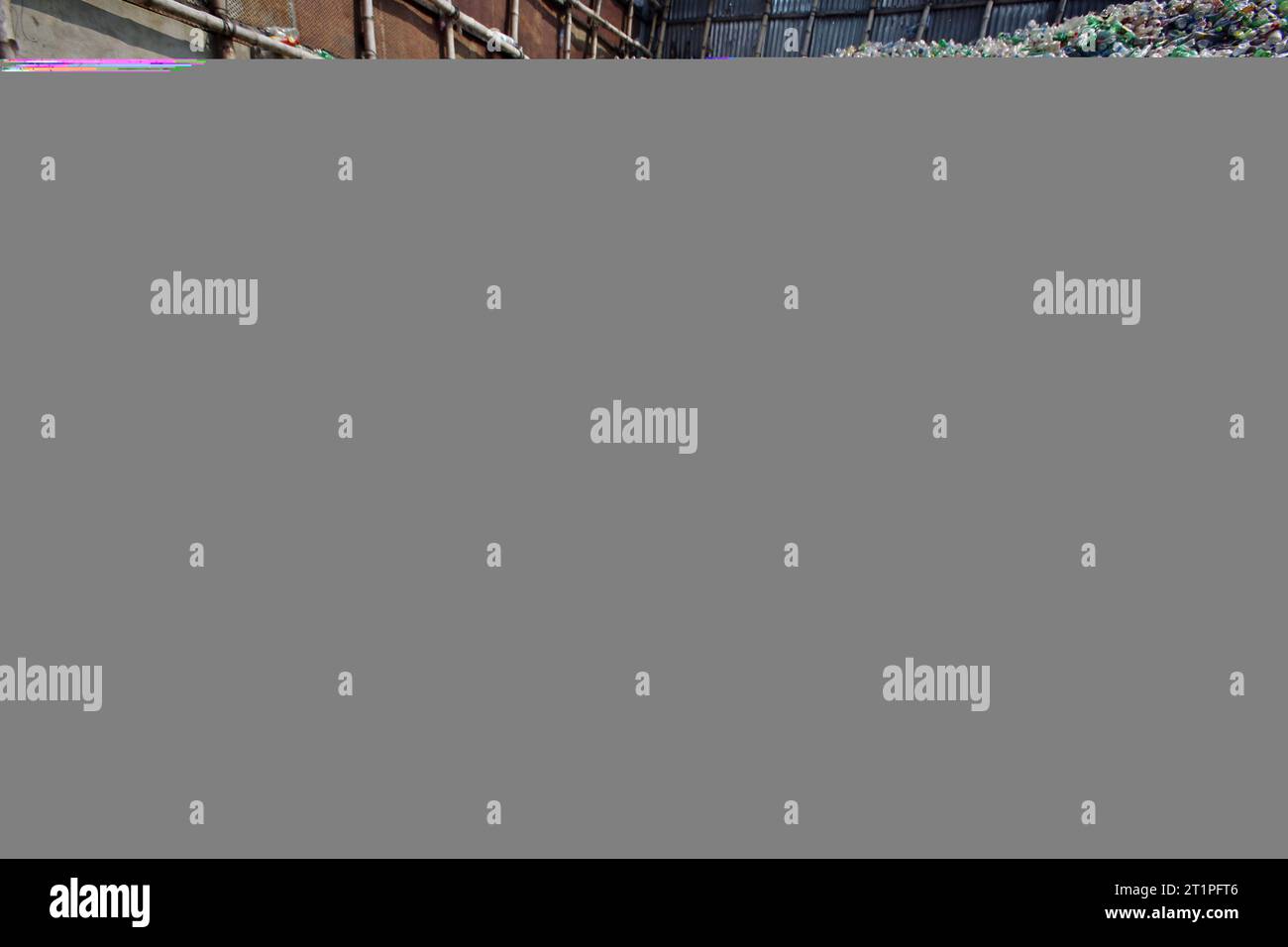 Dhaka, Wari, Bangladesh. 14th Oct, 2023. Employees recycling empty pet