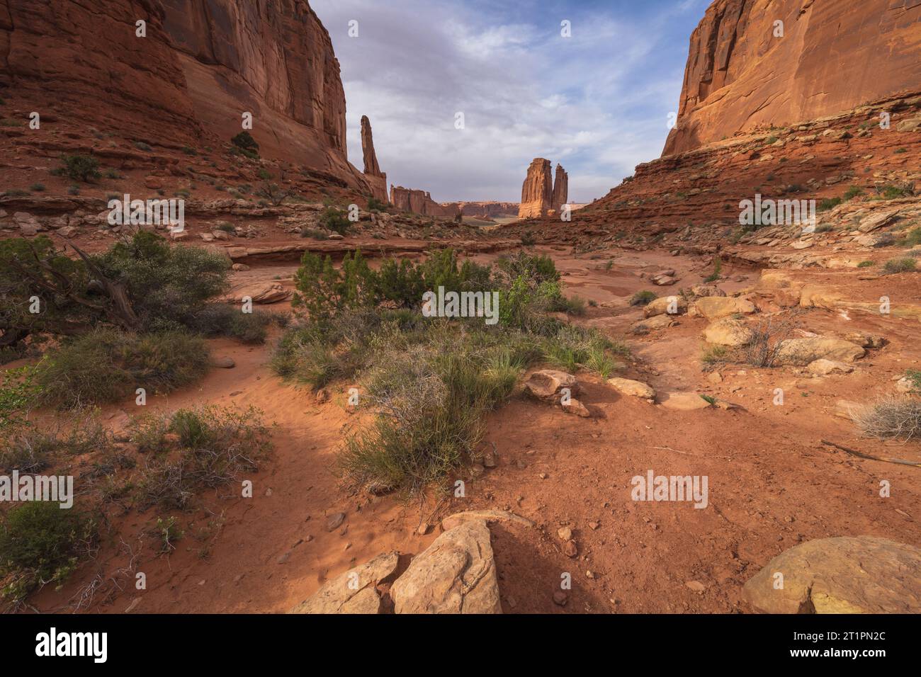hiking the park avenue trail on a cloudy day in arches national park, utah, usa Stock Photo