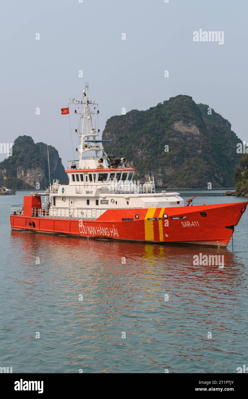 Ha Long Bay, Vietnam. Naval Rescue Boat Searching for Victims of Helicopter Crash. Stock Photo