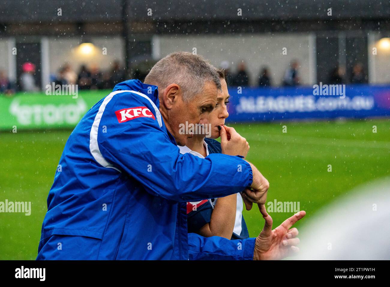 Bundoora, Australia. 15 October, 2023. Melbourne Victory Coach Jeff Hopkins gives directions to Melbourne Victory’s Sarah D’Appolonia (#4) before making a substitution. Credit: James Forrester/Alamy Live News Stock Photo