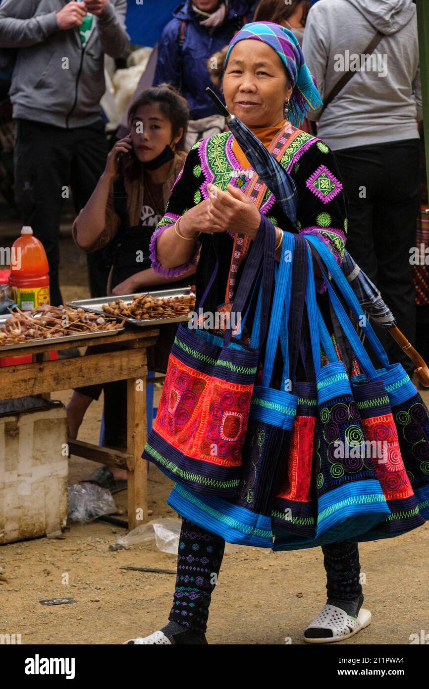 Can Cau Market Scene, Vietnam. Hmong Women in the Market,  Lao Cai Province. Hmong Stock Photo