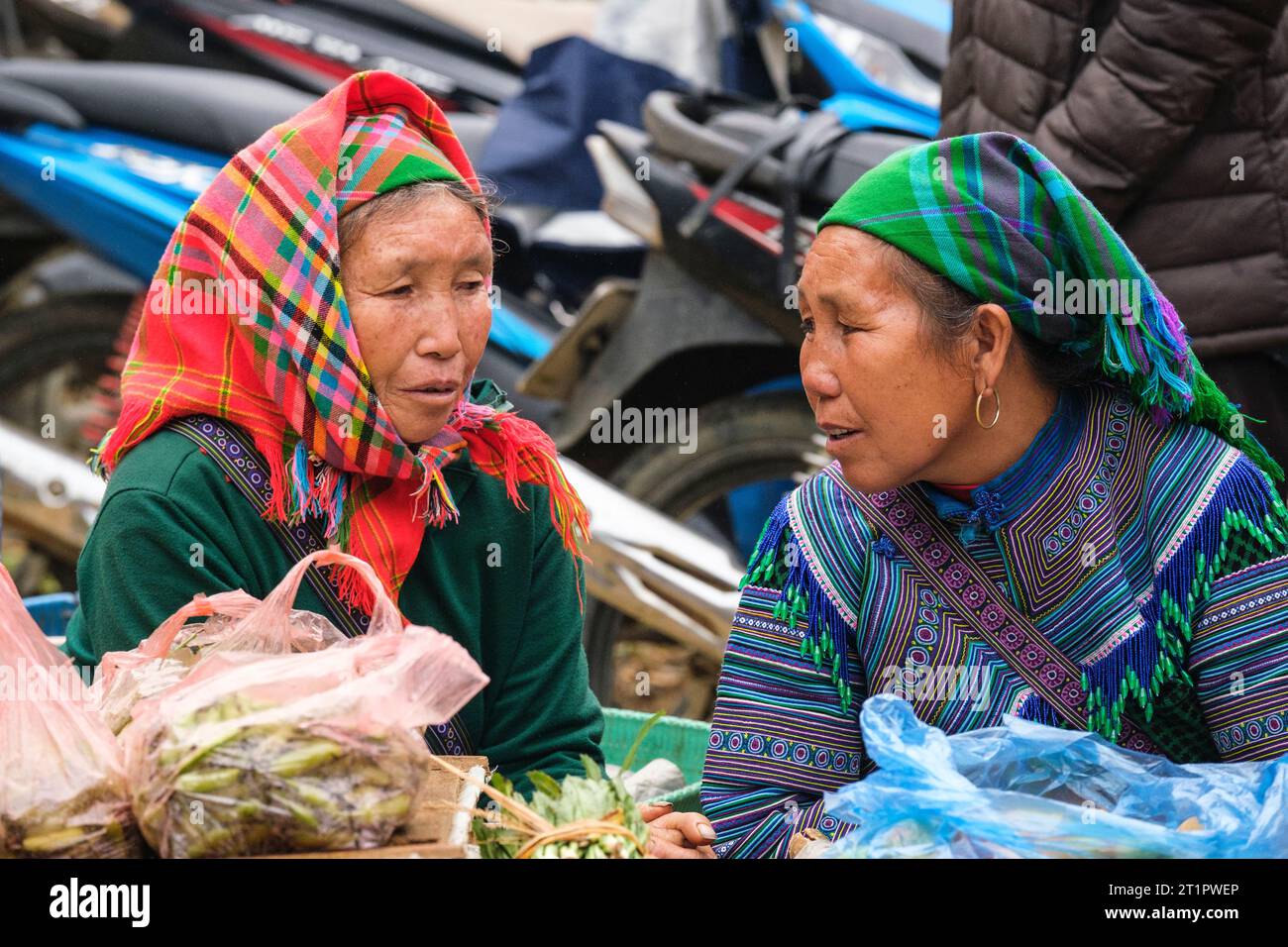Can Cau Market Scene, Vietnam. Hmong Women Talking. Lao Cai Province. Stock Photo