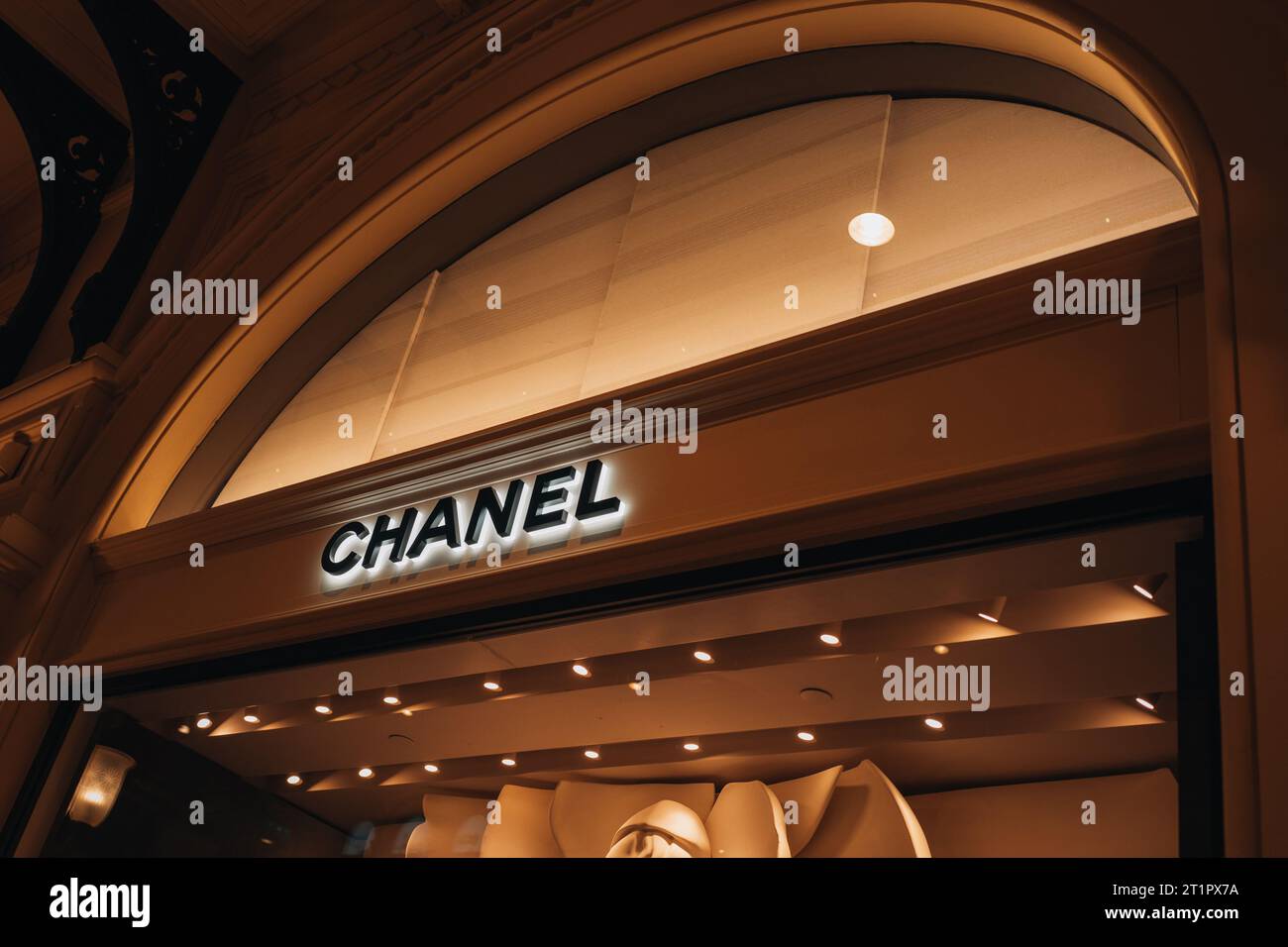 Classic Chanel logotype.Boutique entrance. Chanel is a fashion house founded in 1909 specialized in haute couture goods. Stock Photo
