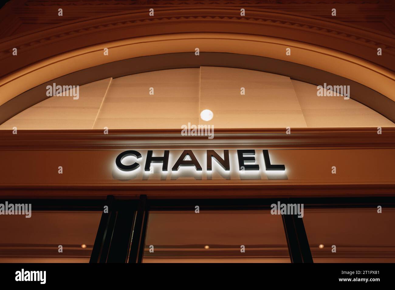 Classic Chanel logotype.Luxury boutique showcase. Chanel is a fashion house founded in 1909 specialized in haute couture goods. Stock Photo