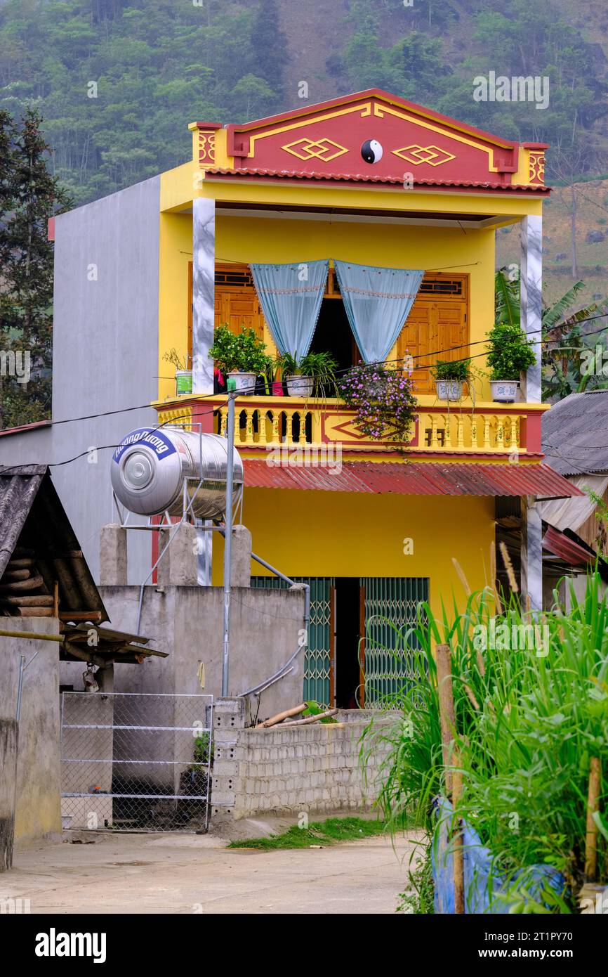 Bac Ha, Vietnam. New House in Hills above Bac Ha, with Water Storage Tank. Lao Cai Province. Stock Photo