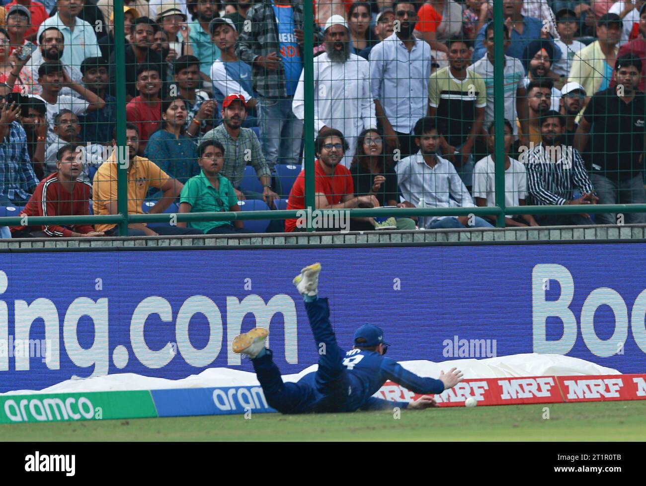New Delhi, Delhi, India. 15th Oct, 2023. Even a good dive could not save the boundary during Match No 13 of ICC Cricket One Day International World Cup between England and Afghanistan at Arun Jaitley Stadium, New Delhi, India on 15 October 2023 (Credit Image: © Avijit Das/ZUMA Press Wire) EDITORIAL USAGE ONLY! Not for Commercial USAGE! Credit: ZUMA Press, Inc./Alamy Live News Credit: ZUMA Press, Inc./Alamy Live News Stock Photo