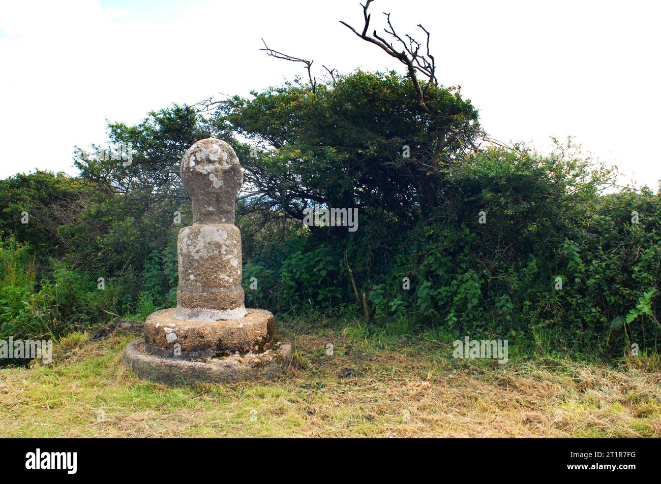 Christianised Cornish Cross with the image of Christ carved on the top, near St. Buryan, Cornwall, UK - John Gollop Stock Photo