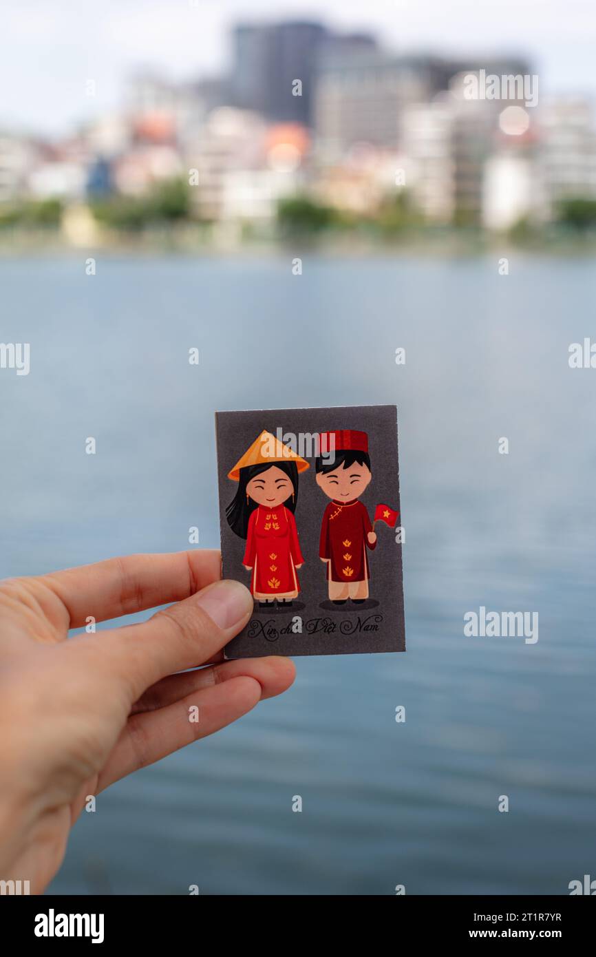 Magnet With Vietnamese Girl And Boy In Traditional Outfits On The magnet-with-vietnamese-girl-and-boy-in-traditional-outfits-on-the