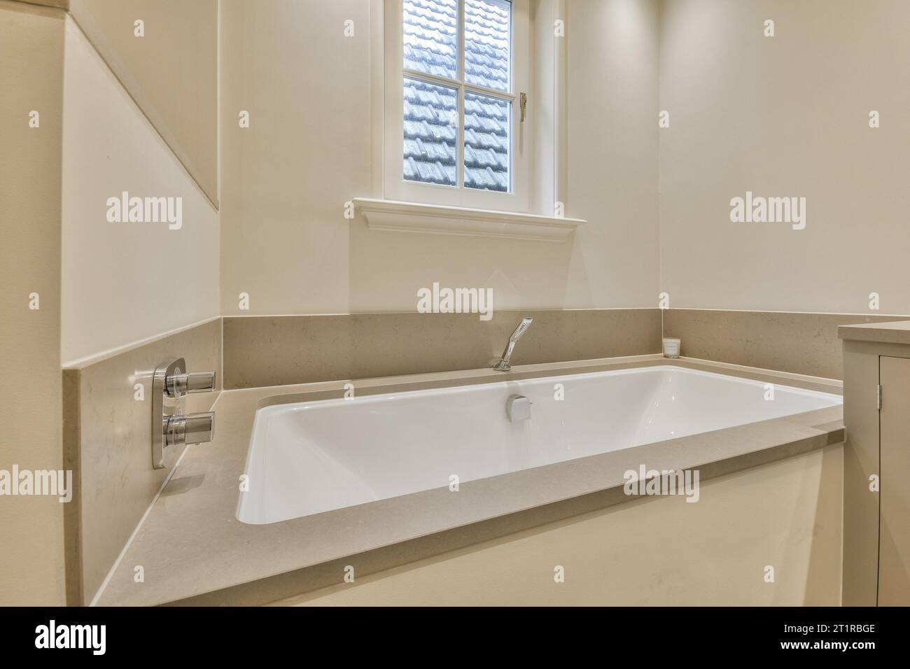 a bathroom with a sink and window in the corner, taken from above to ...