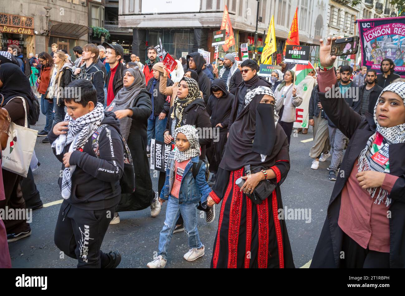 London, UK. 14 Oct 2023: Pro-Palestinian Muslim women and children demonstrate in London, UK, against Israeli attacks on Gaza. Stock Photo