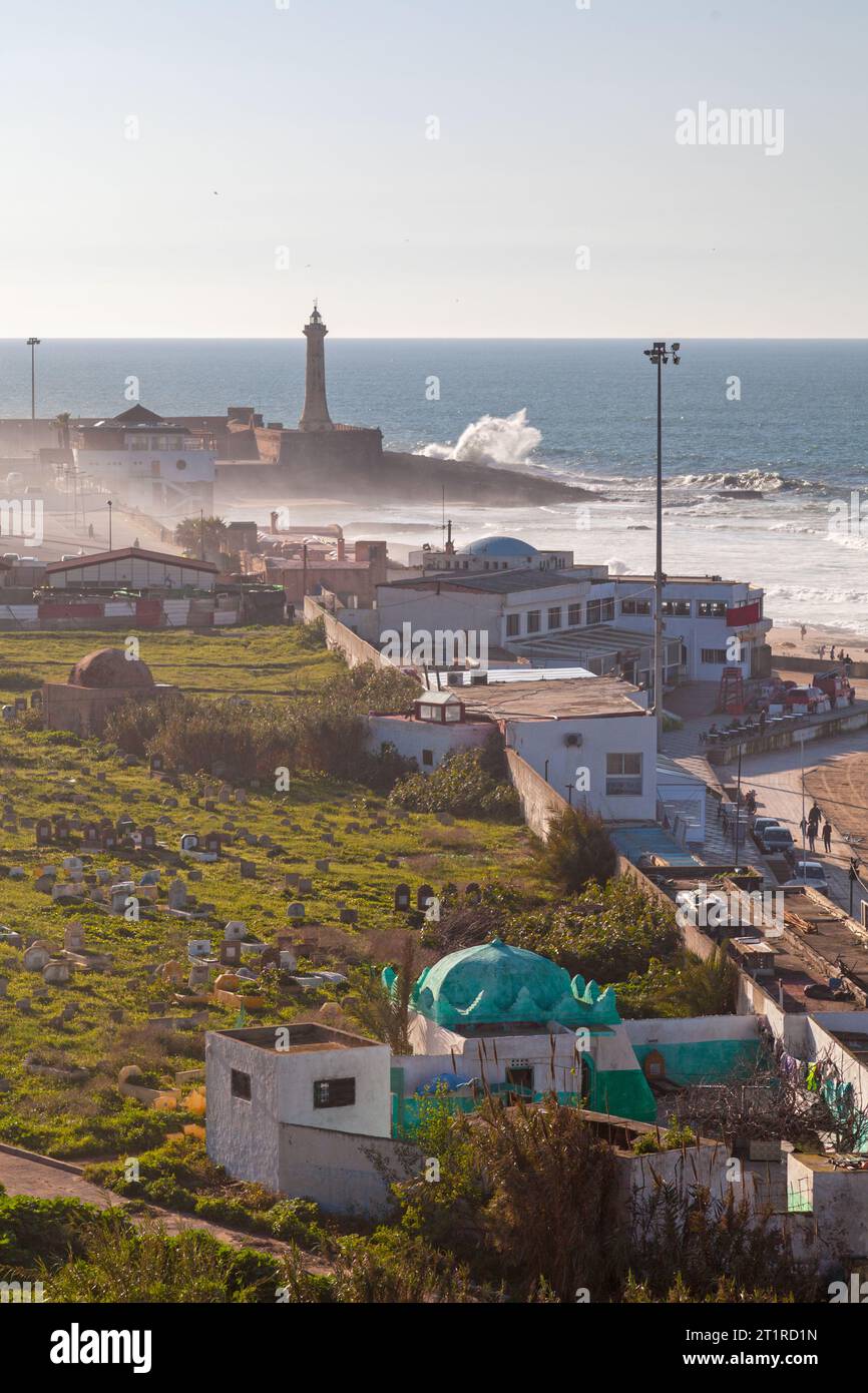 Al Yabouri cemetery with the lighthouse of Rabat on the platform of ...