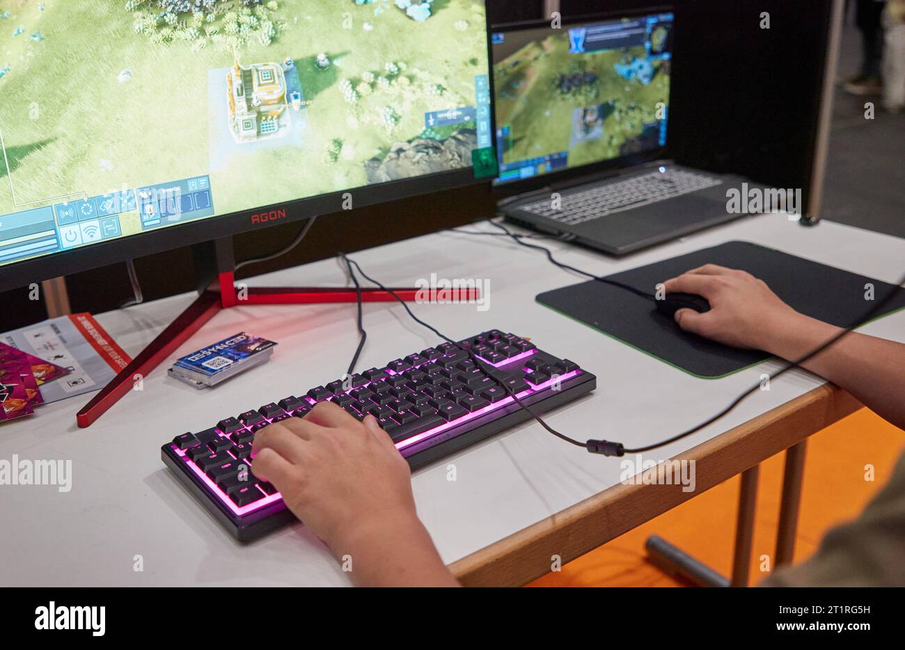 Hamburg, Germany. 15th Oct, 2023. A visitor plays the strategy game Desynced on his computer at the gaming trade show 'Polaris Convention'. Around 200 exhibitors from and for the gaming world are represented at the fair. Credit: Georg Wendt/dpa/Alamy Live News Stock Photo