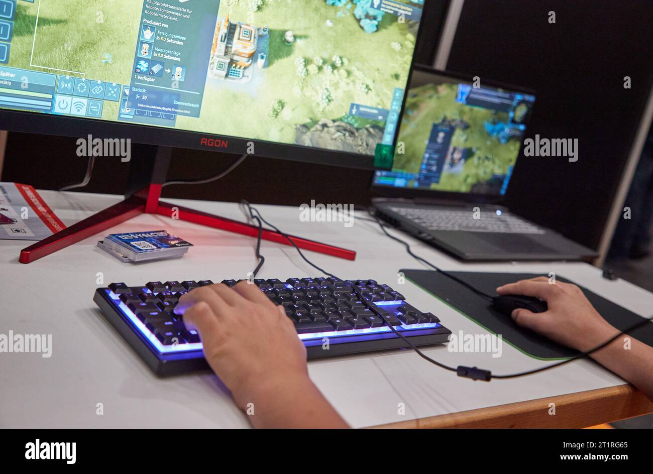 Hamburg, Germany. 15th Oct, 2023. A visitor plays the strategy game Desynced on his computer at the gaming trade show 'Polaris Convention'. Around 200 exhibitors from and for the gaming world are represented at the fair. Credit: Georg Wendt/dpa/Alamy Live News Stock Photo